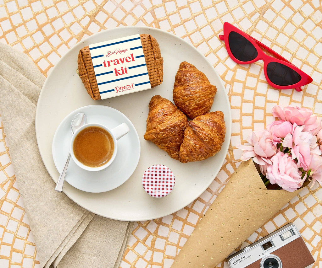 Bon Voyage Emergency Travel Kit | French-inspired, basketweave vegan leather pouch holds 18 essentials for taking your travels to the next level