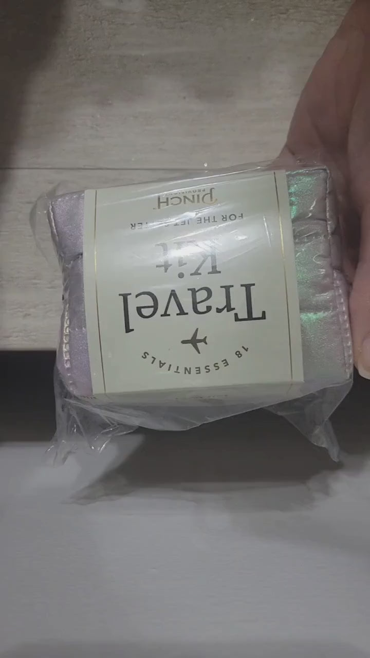 Bon Voyage Emergency Travel Kit | French-inspired, basketweave vegan leather pouch holds 18 essentials for taking your travels to the next level